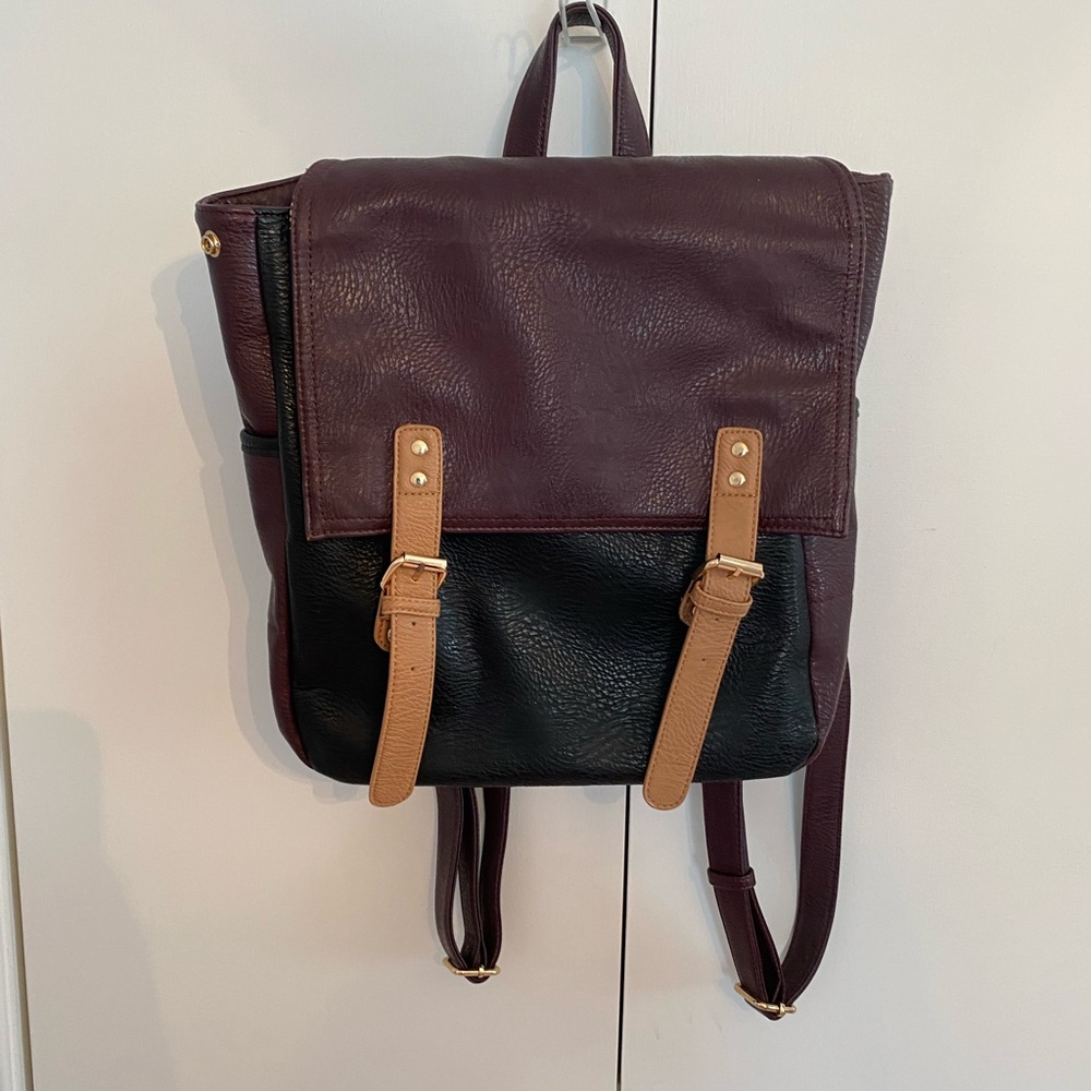 Faux Leather Burgundy and Black backpack with brown and gold accents